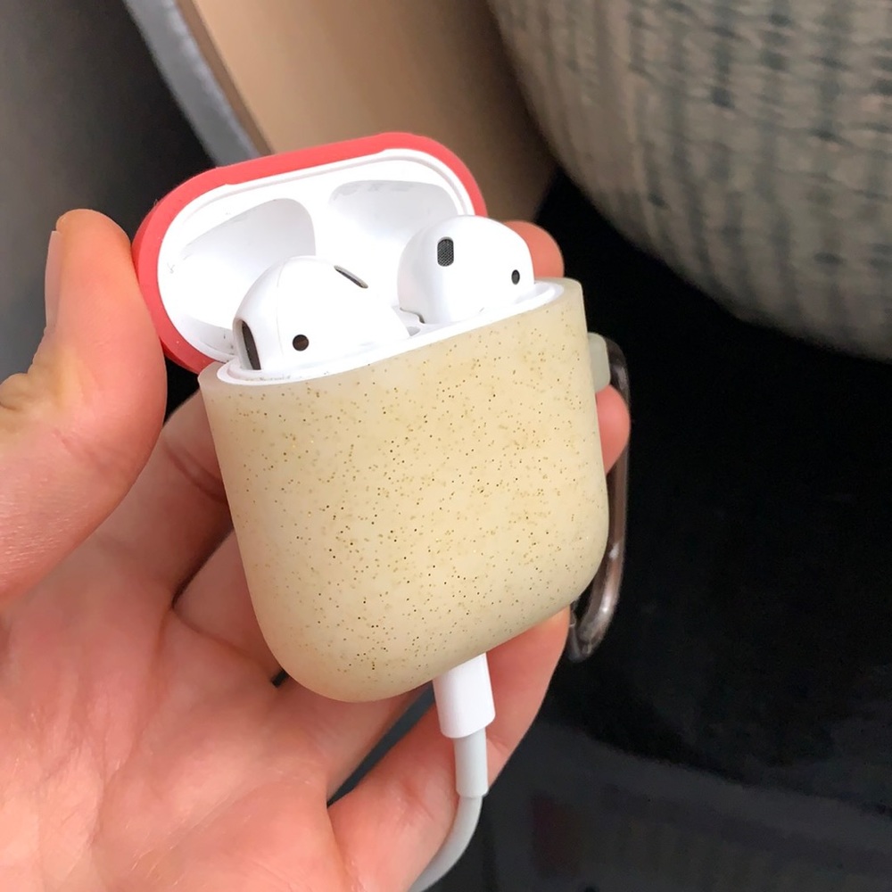 Apple AirPods first generation with glow in the dark sparkly case